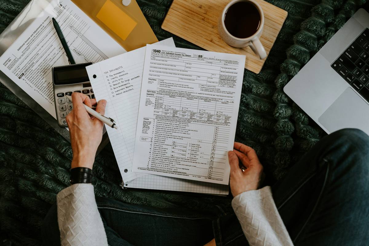 Tax savings plan flowchart showing quarterly review, income triggers, and deduction categories